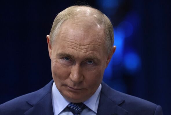 moscow-russia-russian-president-vladimir-putin-grimaces-during-his-meeting-with-participants-7017575.jpg