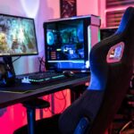 3226529-0-49758600-1790773225-Gaming-chair-at-a-desk-with-gaming-desktop-PC-rig-and-lots-of-RGB-colo.jpeg