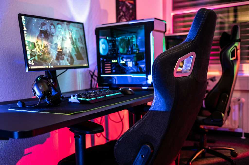 3226529-0-49758600-1790773225-Gaming-chair-at-a-desk-with-gaming-desktop-PC-rig-and-lots-of-RGB-colo.jpeg