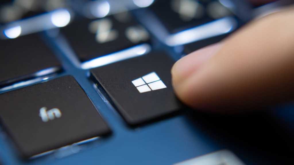 3253724-0-95648500-1792074620-Finger-pressing-Windows-key-on-a-blue-laptop-keyboard.jpg